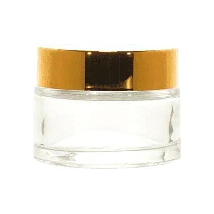 Clear glass cosmetic jar with gold lid for cream or balm packaging