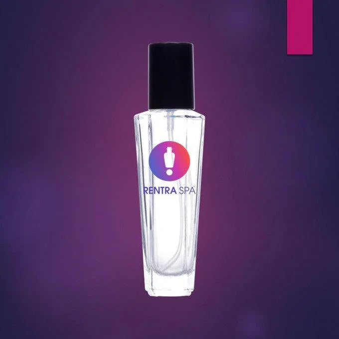 Clear cosmetic glass bottle with black cap on purple background, ideal for perfume packaging