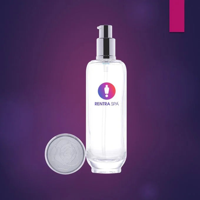 Clear glass pump bottle with RENTRASPA logo, luxury cosmetic packaging on purple background