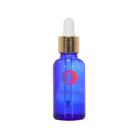 Blue glass dropper bottle with gold cap for cosmetic liquid packaging