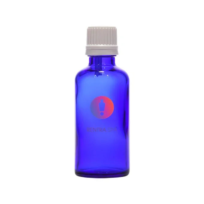 Blue glass cosmetic bottle with white screw cap for skincare or essential oils