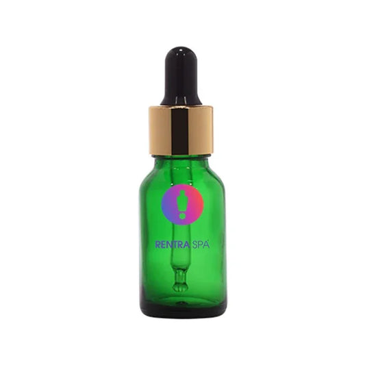 Green glass dropper bottle with gold cap for cosmetic packaging, isolated on white background