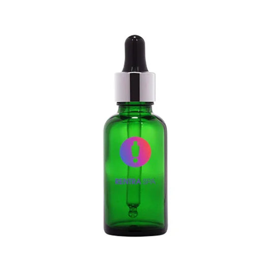 Green glass dropper bottle with silver cap, ideal for cosmetic serum or essential oil packaging
