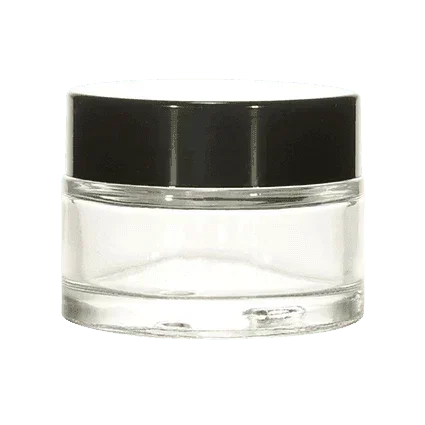 Clear glass cosmetic jar with black screw cap, ideal for skincare packaging