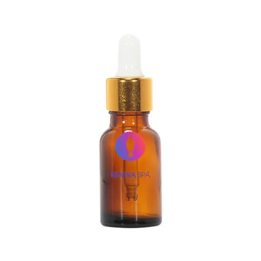 Amber glass dropper bottle with gold cap for cosmetic serum or essential oils