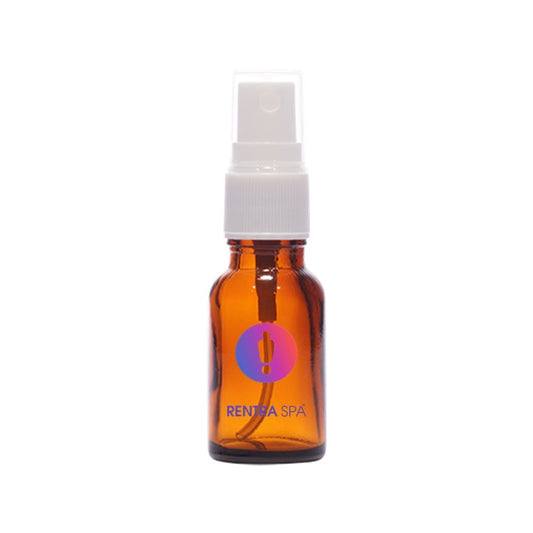 Amber glass spray bottle with white plastic pump, ideal for cosmetic packaging
