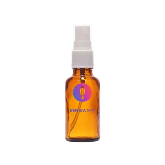 Amber glass spray bottle with white atomizer, used for cosmetic packaging