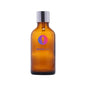 Amber glass cosmetic bottle with metallic cap and colorful logo, ideal for skincare packaging