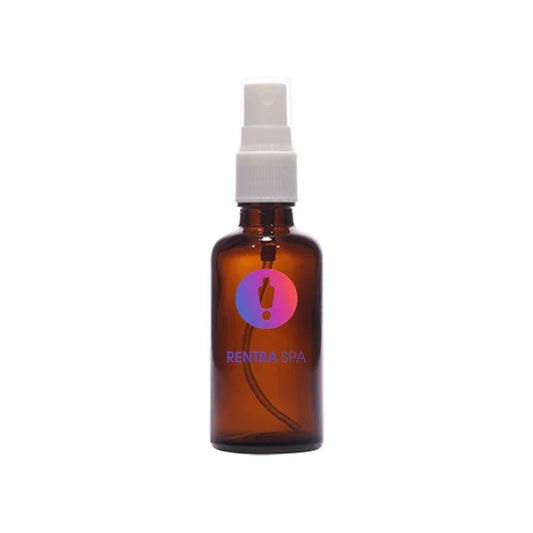 Amber glass spray bottle with white plastic pump, ideal for cosmetic packaging
