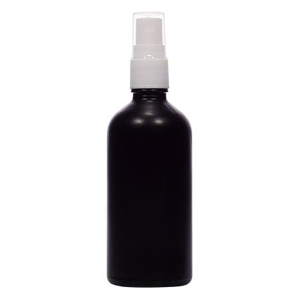 Black glass spray bottle with white plastic pump, suitable for cosmetic packaging