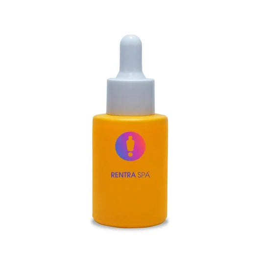 Yellow cosmetic glass dropper bottle with white cap on white background