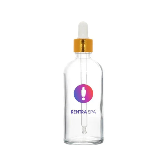 Clear glass dropper bottle with gold cap for cosmetic serum packaging