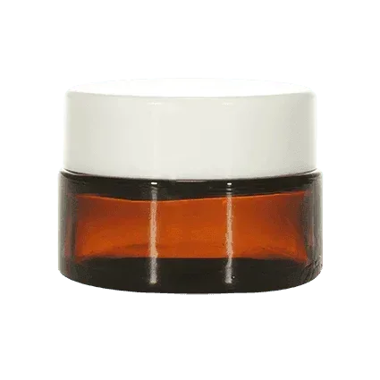 Amber glass cosmetic jar with wide white lid for skincare or cream packaging