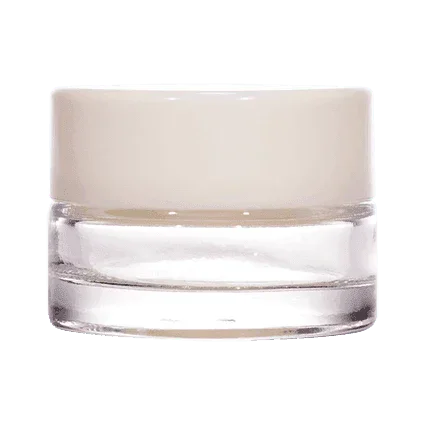 Clear glass cosmetic jar with wide mouth and plain white lid