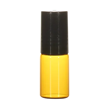 Amber glass cosmetic bottle with black cap for packaging skincare or essential oils