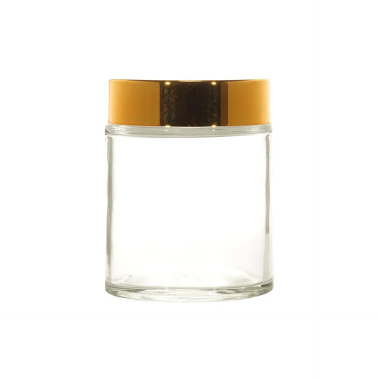 Clear glass cosmetic jar with glossy gold lid for skincare or beauty packaging