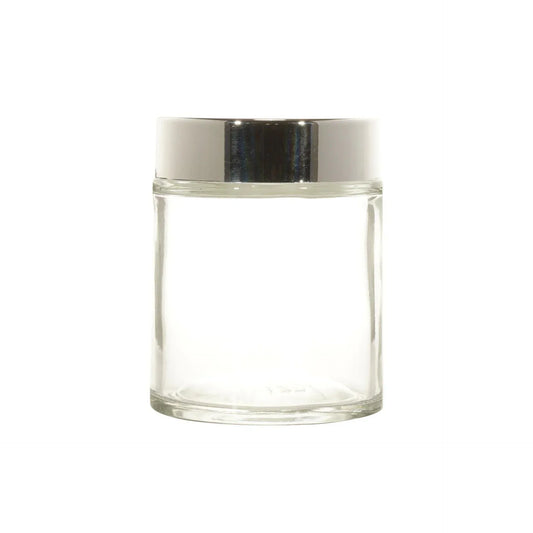 Clear glass cosmetic jar with shiny silver lid for skincare or beauty packaging