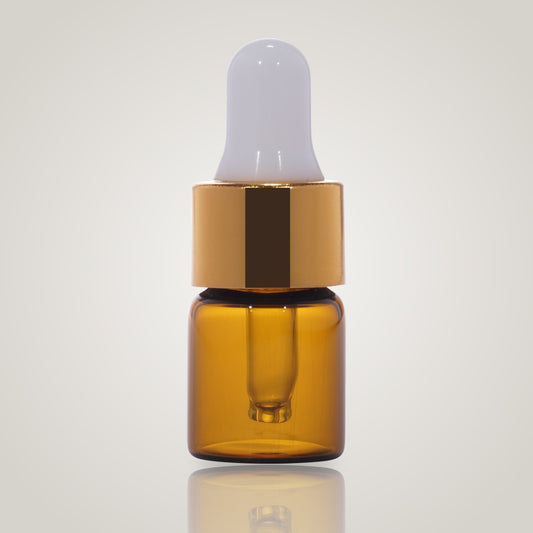 2ml amber glass dropper vial with gold collar and white teat