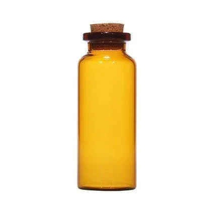 Amber borosilicate glass vial with natural cork stopper, ideal for cosmetic packaging.